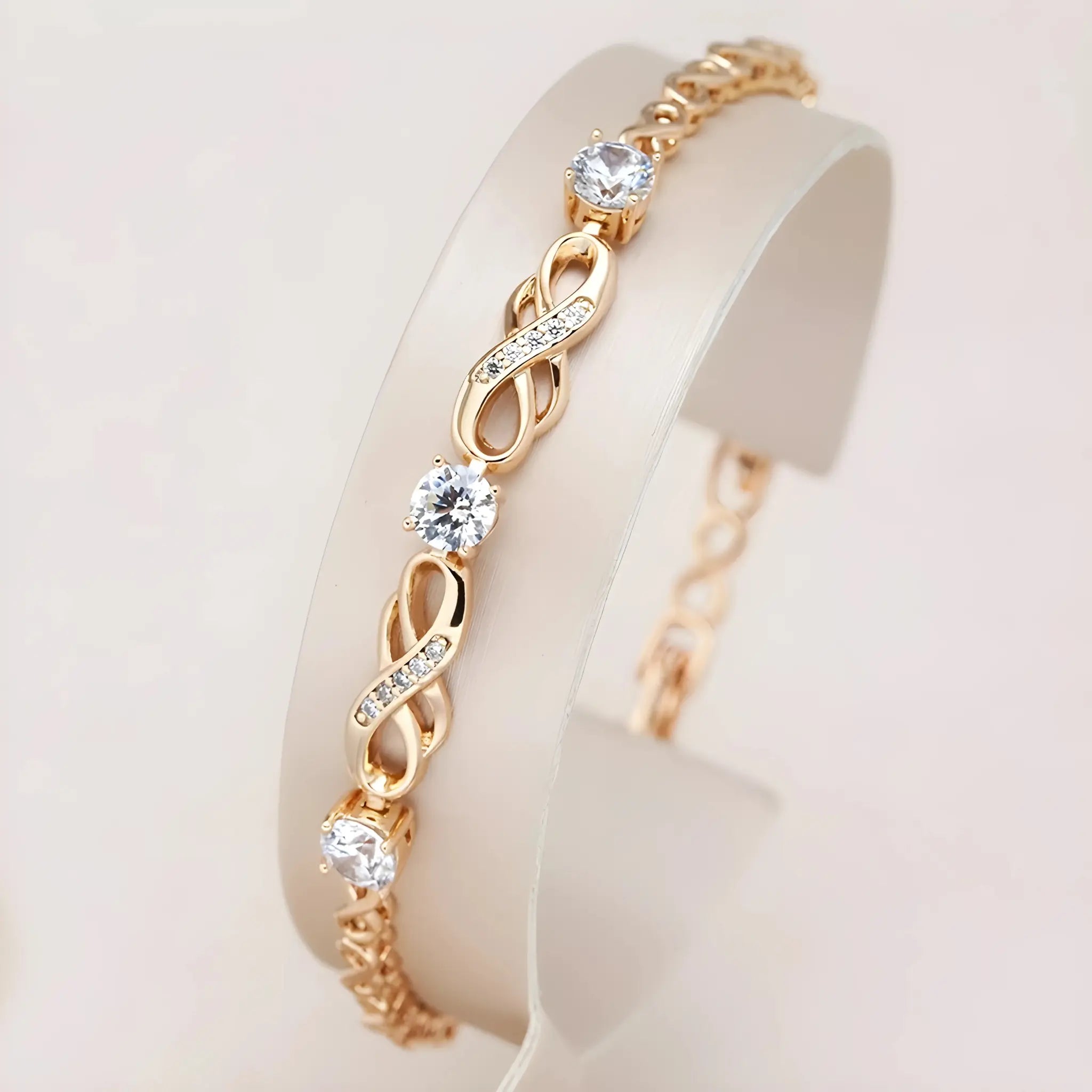 Side view of Rose Gold Sparkle Link Bracelet with infinity-inspired links and cubic zirconia accents.