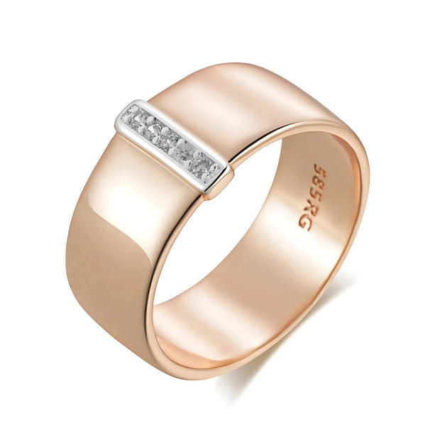 Rose gold ring with diamond accents on a white background